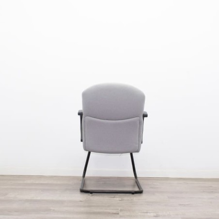 Silla confidente base patín tapizado gris