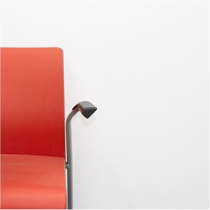 Silla colectividad cromada y naranja con pala