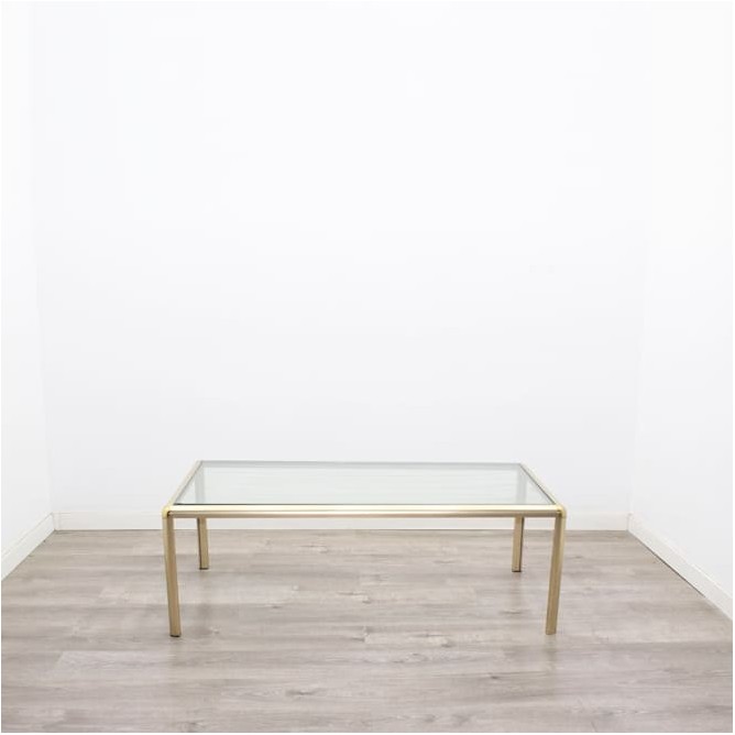 Mesa de centro metálica en dorado y tapa de cristal 120cm