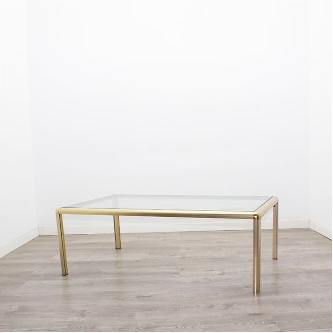Mesa de centro metálica en dorado y tapa de cristal 120cm