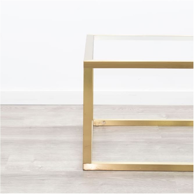 Mesa baja centro dorada y de cristal de 120cm