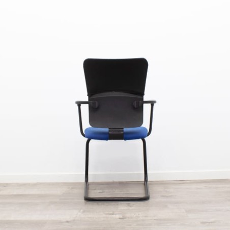 Silla confidente bicolor con base patín y brazos