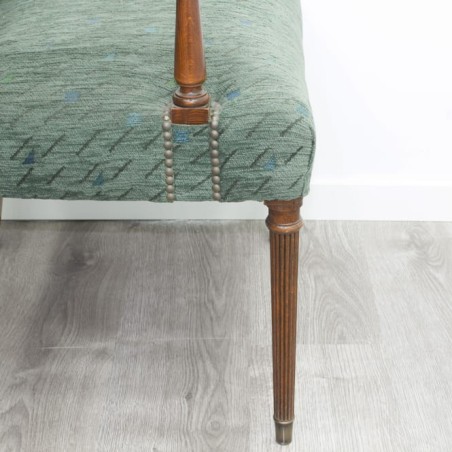 Sillón fijo en terciopelo verde con brazos